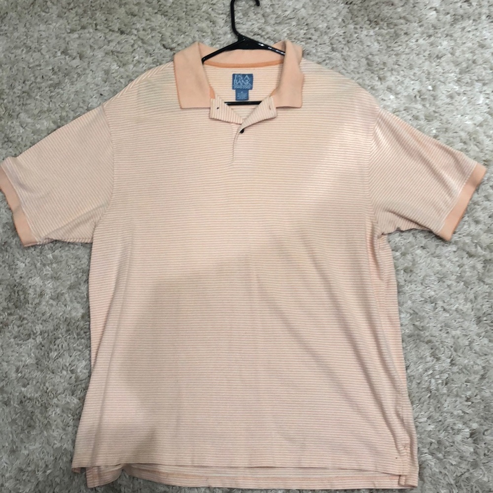 Jos. A. Banks stays cool polo. Size XL. Color: pale orange and white